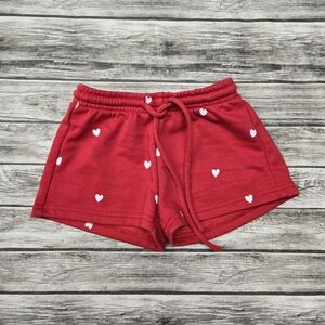 Pink lily red shorts with white hearts